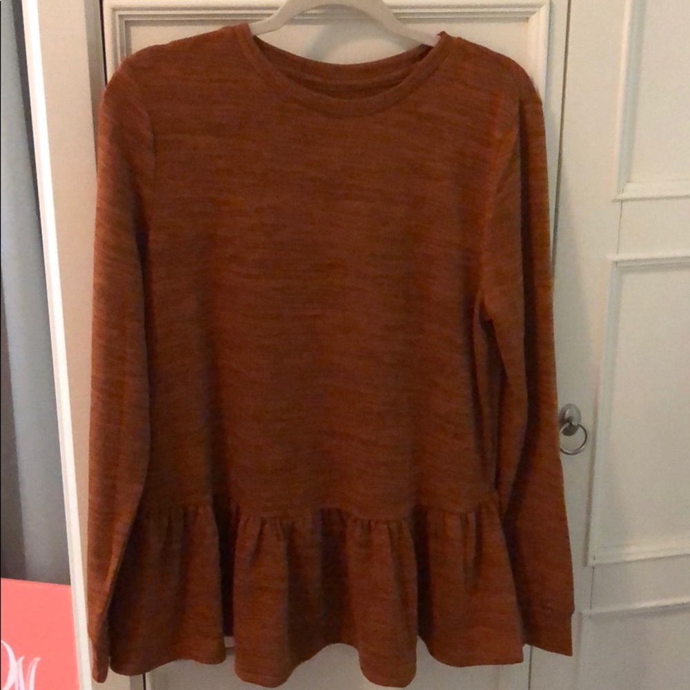 Adorable peplum shirt